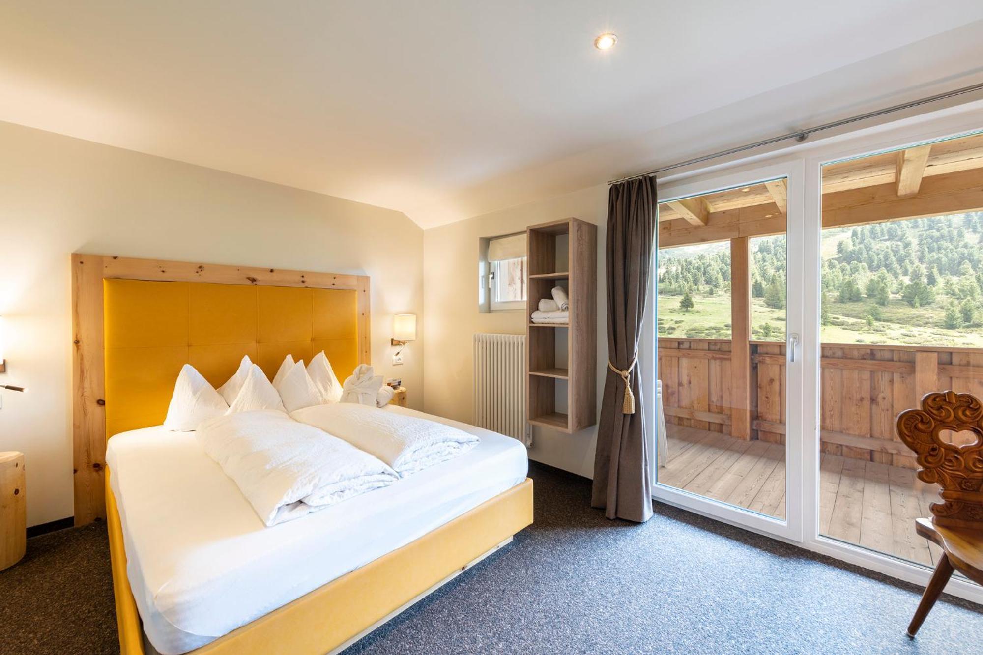 Berghotel Jochgrimm - Your Dolomites Home Варена Номер фото